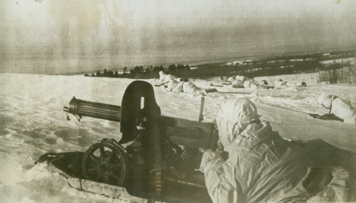 WHITE-CLAD REDS OUST NAZIS FROM DEMYANSK, 3/7/1943. DEMYANSK AREA—Far from the thawing Ukraine, white-clad Russian skiers drive back the Nazis in the Demyansk area. After ousting the Germans from this northern strongpoint, the Soviets who are skilled in the ways of winter thrust west to frozen land bordering Lake Ilmen. The Russians are apparently determined to force Hitler from the cold country before Spring sets in.Credit: Acme;