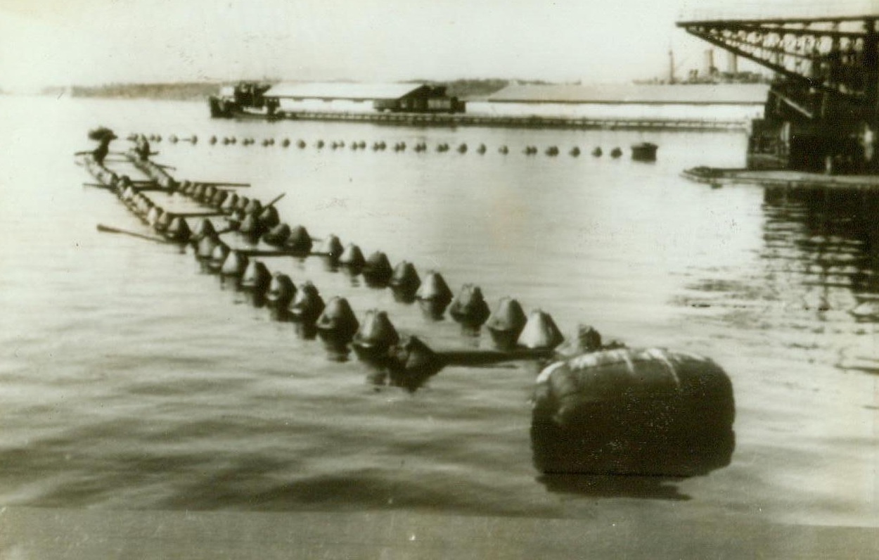 NAZIS HAVE NORWEGIAN SHIVERS, 5/27/1943. OSLO, NORWAY – Fearing Allied invasion of Norway, the Nazis have erected anti-torpedo nets in Oslo Harbor. The Germans, whose war strength is being sapped by Allied bombs, are barricading themselves behind coastal fortresses, jittery over things to come Credit (ACME Radiophoto);