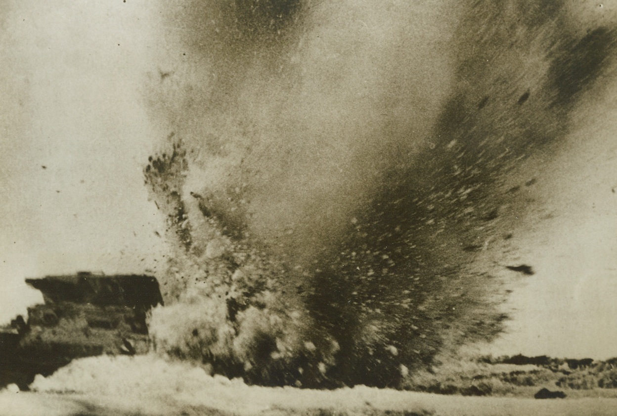 Big Boom, 1/6/1943. Voronezh, U.S.S.R.—A Nazi tank touches off a mine laid by the Russians during a German counter-attack in advanced Russian troops in the Voronezh area and—BOOM! Photo was made as the tank scattered in a million pieces on the battlefield. Latest reports from the Soviet front indicate that the Axis is in disorderly retreat from the north Caucasus area and that the Red Army has bagged 26,500 more Nazis. Passed by censor. Credit: ACME.;