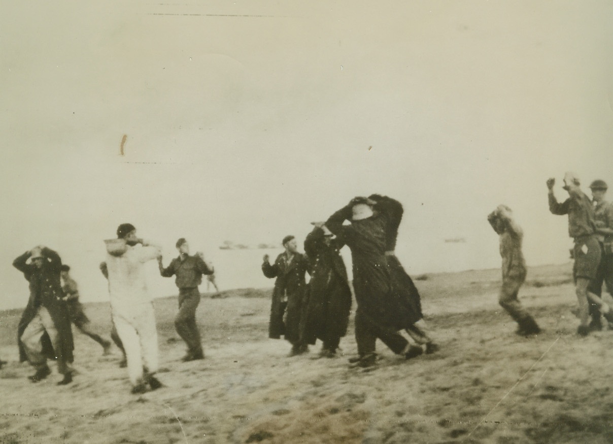 First Captives at Salerno, 9/14/1943. ITALY – These disorganized Nazi prisoners of war, the first batch to be rounded up on the beach after the Allied landing in Salerno, bear little resemblance to “super-men.” Their Axis comrades, however, are putting up stiff resistance to our onslaught, fighting desperately in the most bitter action of the invasion campaign. Credit Line (British Army Photo from ACME Transmitted from OWI);