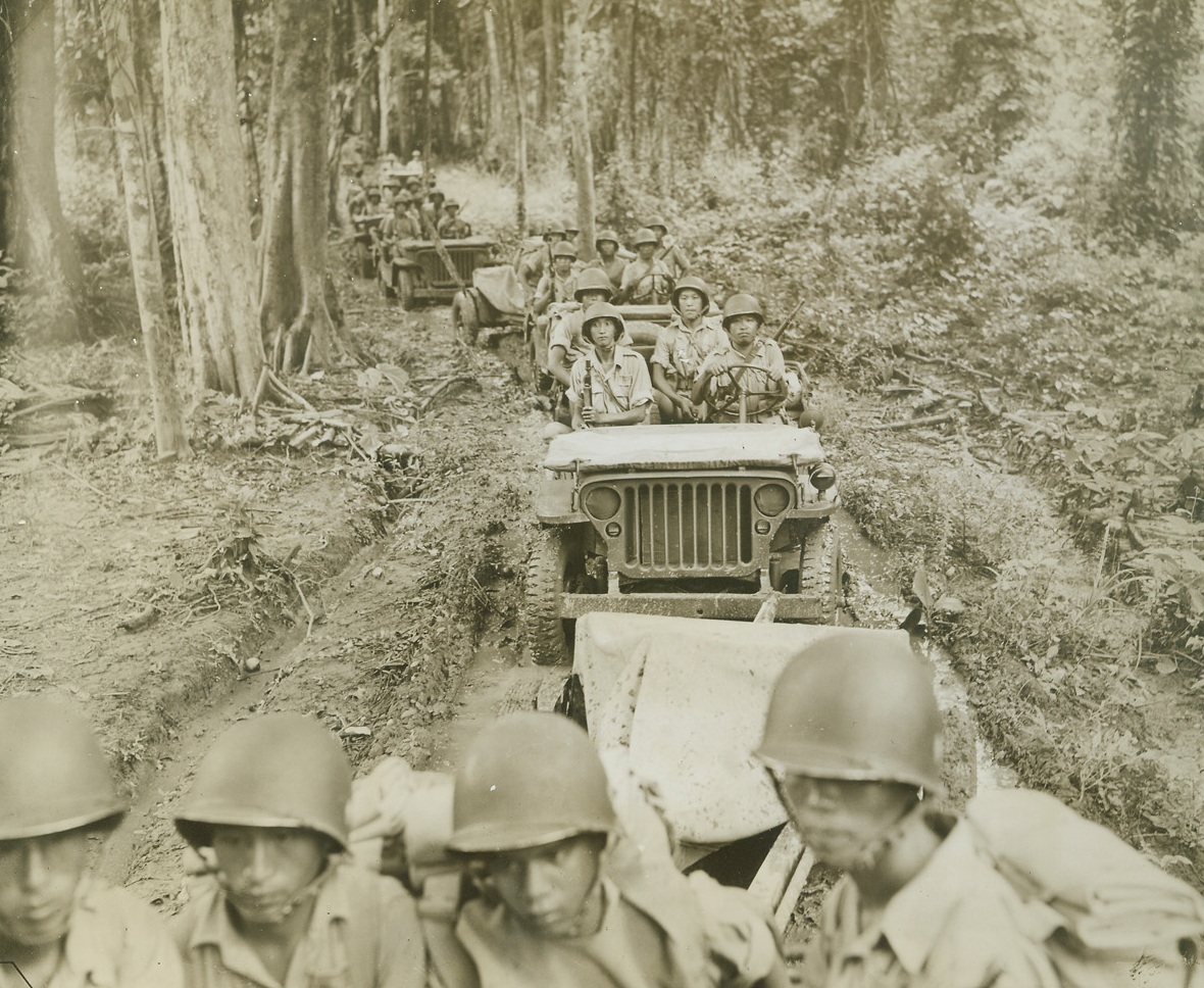 Chinese Fighters Man Yank Jeeps, 10/14/1943. CBI Theater – The famous American jeep is no mystery to these Chinese fighters, for they have been trained in the use of all the latest war weapons at the U.S. training center for Chinese in India, under Lt. Gen. Joseph Stilwell’s supervision.  A September 16 communique reported that the Chinese fighters fought a skirmish with 200 Japanese in the Naga Hills of North Burma.Credit (ACME photo by Frank Cancellare, War Pool Photographer);