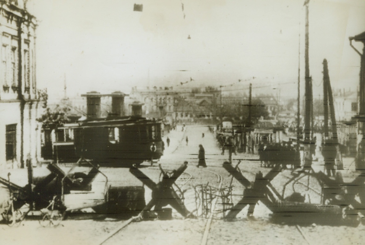 Germans Barricade Kiev, 10/30/1943. Russia – Photo just radioed from Stockholm shows a Russian city, not identified by the German caption, but which is probably Kiev, as it has been prepared by Nazis for Red Army onslaught. The Eastern portion of the city has become a front zone and had been barricaded. Barricades are trespassable only by persons with permits.Credit: ACME Radiophoto;