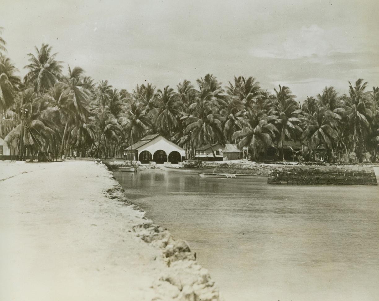 Tarawa’s Capture Assured, 11/23/1943. Washington, D.C. - - This photo, released by the Navy department today, shows the harbor at Tarawa in the Gilbert islands where, it was announced today, U.S. Marines have consolidated their position and their capture of the Atoll is “assured”.  Also, it was stated that U.S. Army troops of the 27th division had captured Makin, in the same group. Credit line (U.S. Navy official photo from ACME);