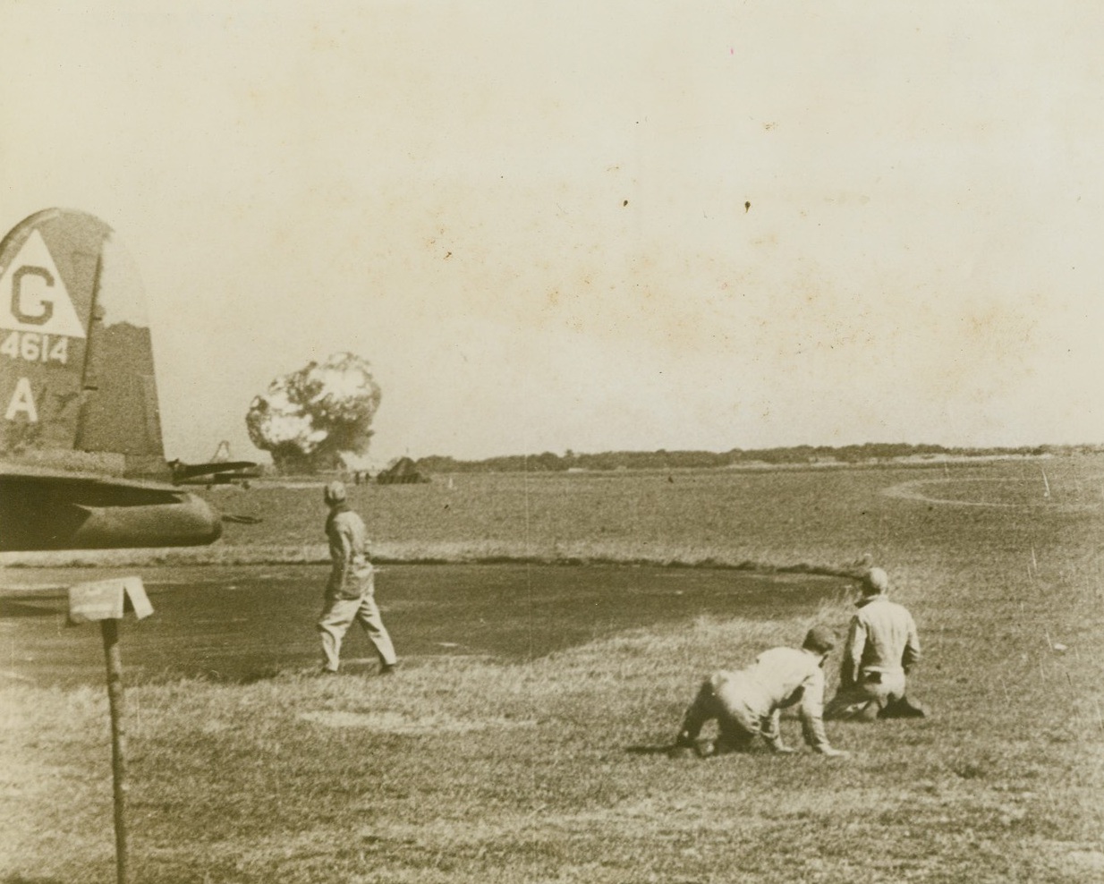 HOMECOMING OF A FLYING FORT, 11/5/1943. ENGLAND – After terrific Schweinifurt raid, which our airmen prefer to call an “invasion from the sky”, one of the big bombers came in for a landing, but flak and German fighter fire had crippled her.  A great ball of fire, expanding with the speed of light, appeared the instant she hit ground.  Anxious ground men watch in foreground.  Price of raid to the U.S. 8th Air Force was 60 bombers – to the Germans, 144 planes and a smashing blow at her industry. Credit: US Army Air Forces by news of the day newsreel from Acme;