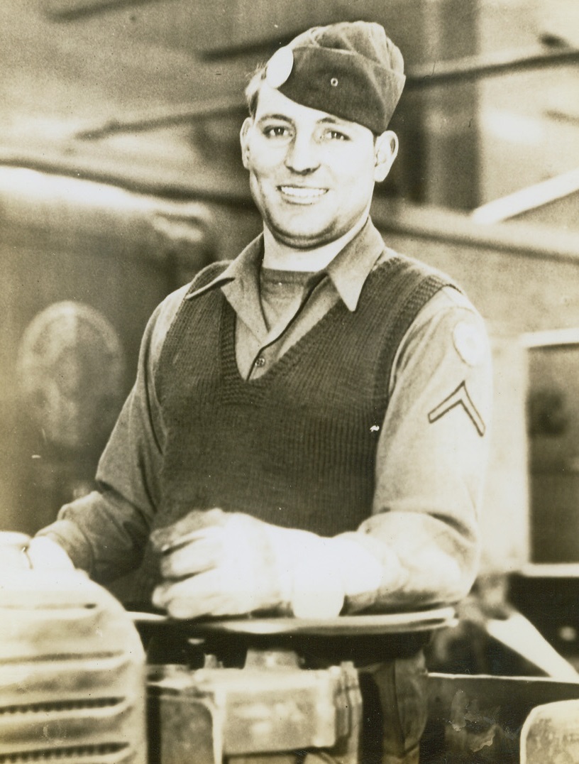 Soldier Works on Furlough, 12/23/1943. Muskegon, Michigan -- Home from the Aleutians on furlough, his first in 18 months, Pfc. William Beckley of Muskegon Heights, Michigan, is spending it working 16 hours a day at his old job of operating a lift truck in a foundry. To him, all-out war effort means just that. Credit: ACME;