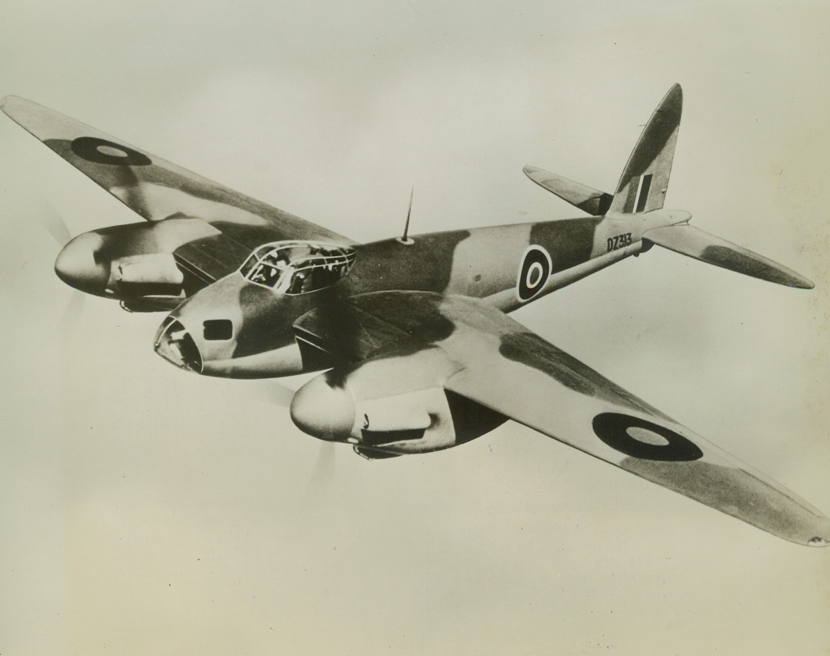 FIRST PHOTO OF NEW BRITISH “MOSQUITO”, 10/29/1942. This is the first photo to be released of the sensational new British de Havilland “Mosquito” reconnaissance bomber, which has done excellent work in recent raids over enemy territory, including France and parts of Germany. It is of simple wooden construction, is powered by two Rolls Royce engines and is armed with four 20mm cannon and four .303 machine guns. It is credited with high speed and long range.  Credit Line (ACME);