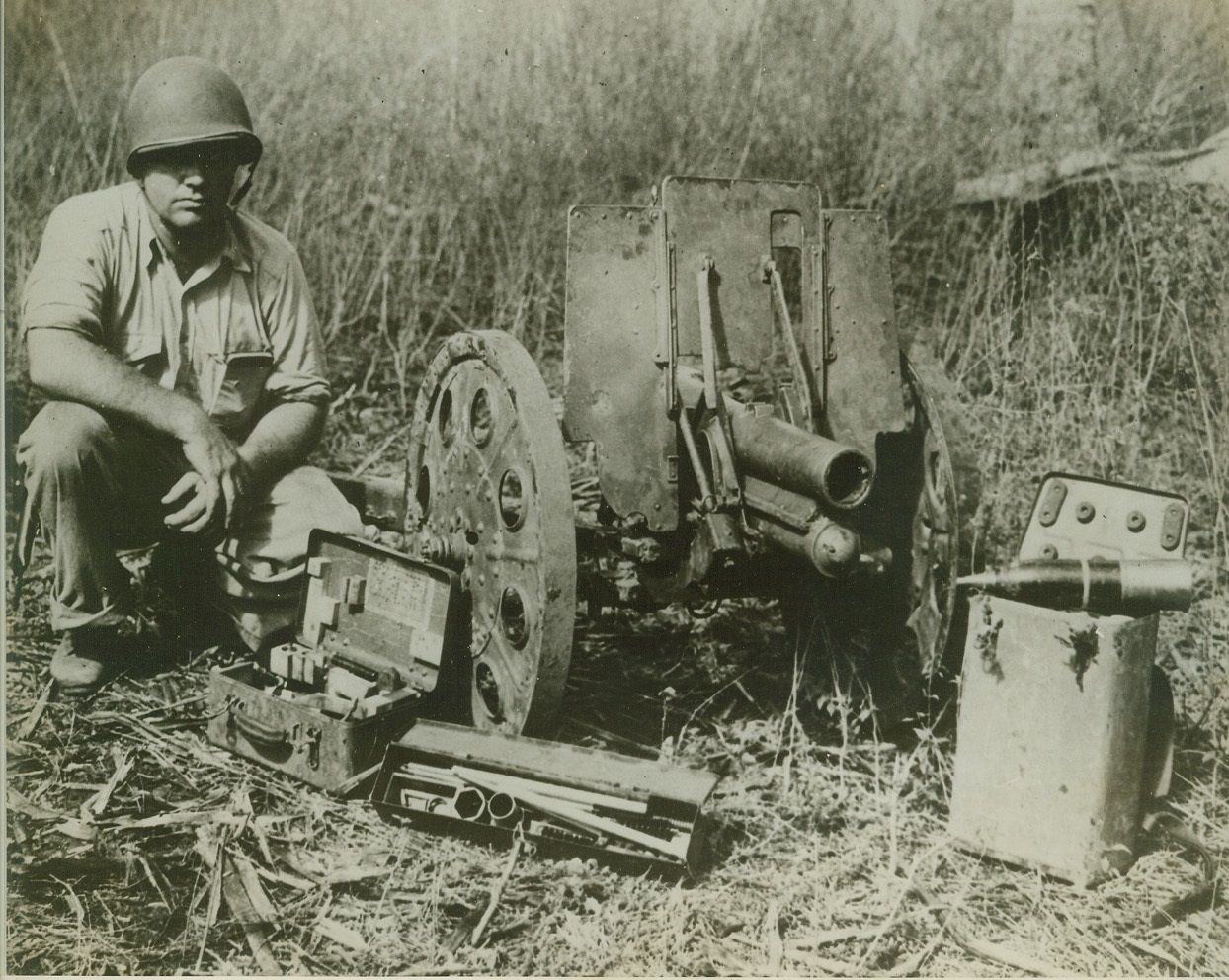 Battle Raging in the Solomons, 10/15/1942. United States forces are striving to prevent the Japanese from landing reinforcements on Guadalcanal.  The above photo just released by the US Navy shows a small Japanese piece that was captured by U.S. Marines during the early stages of the battle of the Solomons.  It is a 70 m gun, classified as an infantry weapon.  It was taken during fighting on Guadalcanal. Credit line (U S Navy official photo from ACME);