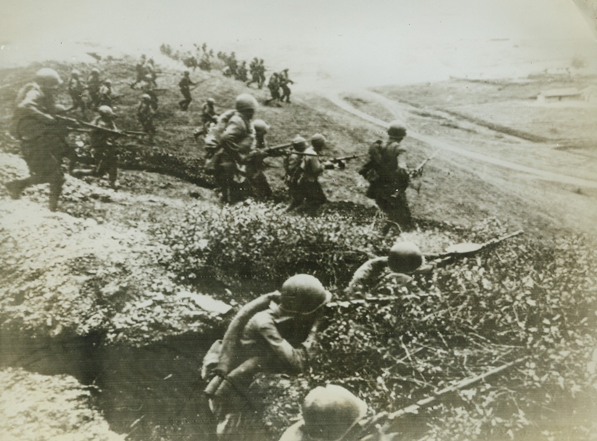 Nazi Spearhead Blunted in Caucasus, 10/28/1942. New York, N.Y.—In this photo, flashed by radio from Moscow to New York, Oct. 28, Red Guardsmen are shown attacking the Nazis in the Nozdok area of the northern Caucasus. Today’s information from the area, indicates that Nazis driving toward valuable Caucasus oil fields have been pushed back from Tuapse in heavy mountain combat. Passed by censors. Credit: ACME radiophoto.;