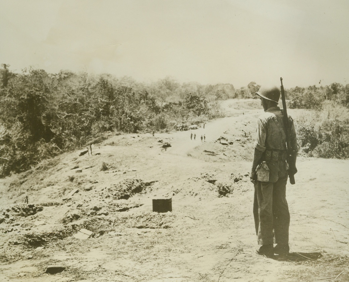 600 Japs Died Here, 11/7/1942. Guadalcanal, S.I. – Six hundred Japs died as U.S. Marine raider battalions, entrenched on this ridge, turned back thrust after thrust by the enemy.  Heavy artillery was used to defend the ridge, which protects Guadalcanal’s all-important airport, Henderson Field.Credit Line (U.S. Marine Corps photo from ACME);