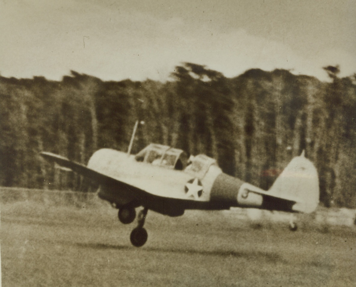 TICKLISH LANDING, 12/18/1942. Not even a tight rope walker would want to tackle the problem of this U.S. Navy SNC pilot who has one wheel down and the other up. Unable to stay in the air indefinitely, nor to release his jammed landing gear, he had no choice but to come down and make the best of a precarious job. Credit: Official U.S. Navy photo from Acme;