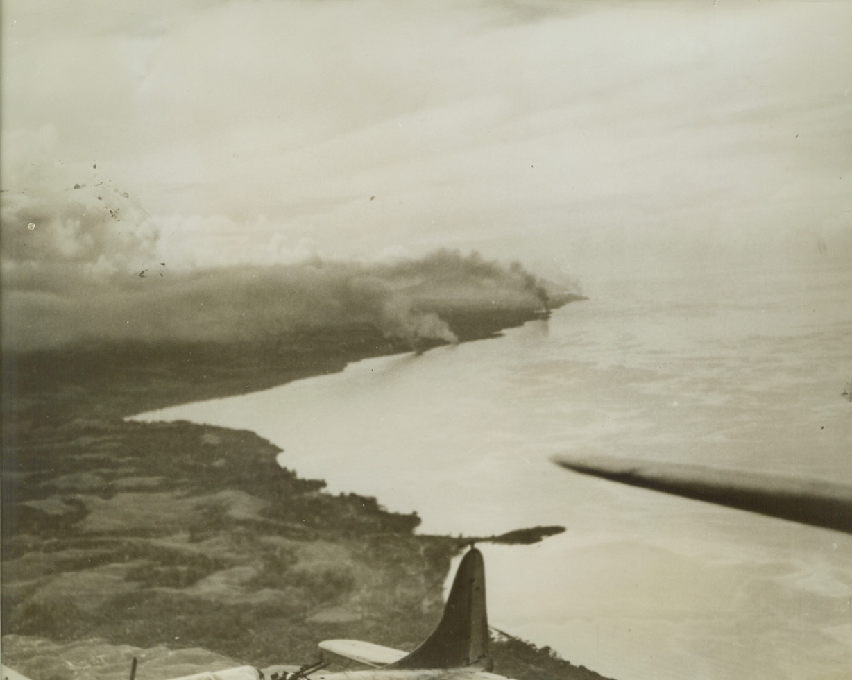 After Japs Lost the Battle, 12/21/1942. Guadalcanal – Four plumes of smoke mark the end of as many Japanese cargo vessels, which were beached during the battle of Guadalcanal at Tassafaronga, about 7 ½ miles West of U.S. positions on Guadalcanal.  They were found by U.S. forces on Nov 15th last, and were destroyed by aerial bombs, artillery and naval gun fire.  In addition, the enemy lost 11 warships, including one battleship, and eight transports and suffered damage to seven other warships.  American losses in the battle were two light cruisers and six destoyers.Credit Line (U.S. Navy photo from ACME);