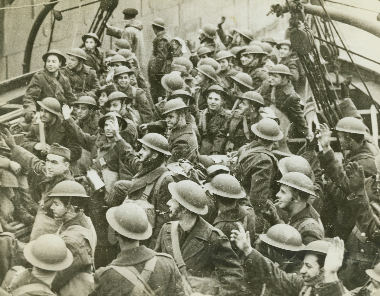 American Troops on Tender in Irish Port, 2/8/1942. In a Northern Irish Port -- American troops aboard a tender, on their way from a troopship to shore, recently, when the first A.E.F. to arrive in the British Isles during World War Two, reached “a northern Irish port.” Passed by censors. Credit: ACME;