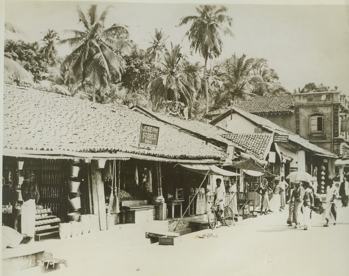 CEYLON KEY TO INDIA AND ALLIED LIFELINES, 3/11/1942. The island of Ceylon, only 18 miles from Southern India, with its strategic Naval Base at Trincomalee commanding the sea routes to India, to Russia, and to the jumping off place in the new lifeline to China from Calcutta, must be held at all costs as the key to vital supply lines to and from the Near and Far East and as a possible starting point for a United Nations counter-offensive, says Professor William A. Beer of Boston University, onetime Trade Commissioner from Ceylon to U.S., who spent 16 years on the island. “If the Japanese should gain control of Ceylon,” he continued, “the industries of India would be immobilized because of lack of transport, it would be increasingly difficult to use her available manpower in any offensive back over the routes that Japan already traveled, and finally, Russia and China would be effectively isolated from Allied Aid. Here are some scenes on the important island. Credit: ACME;