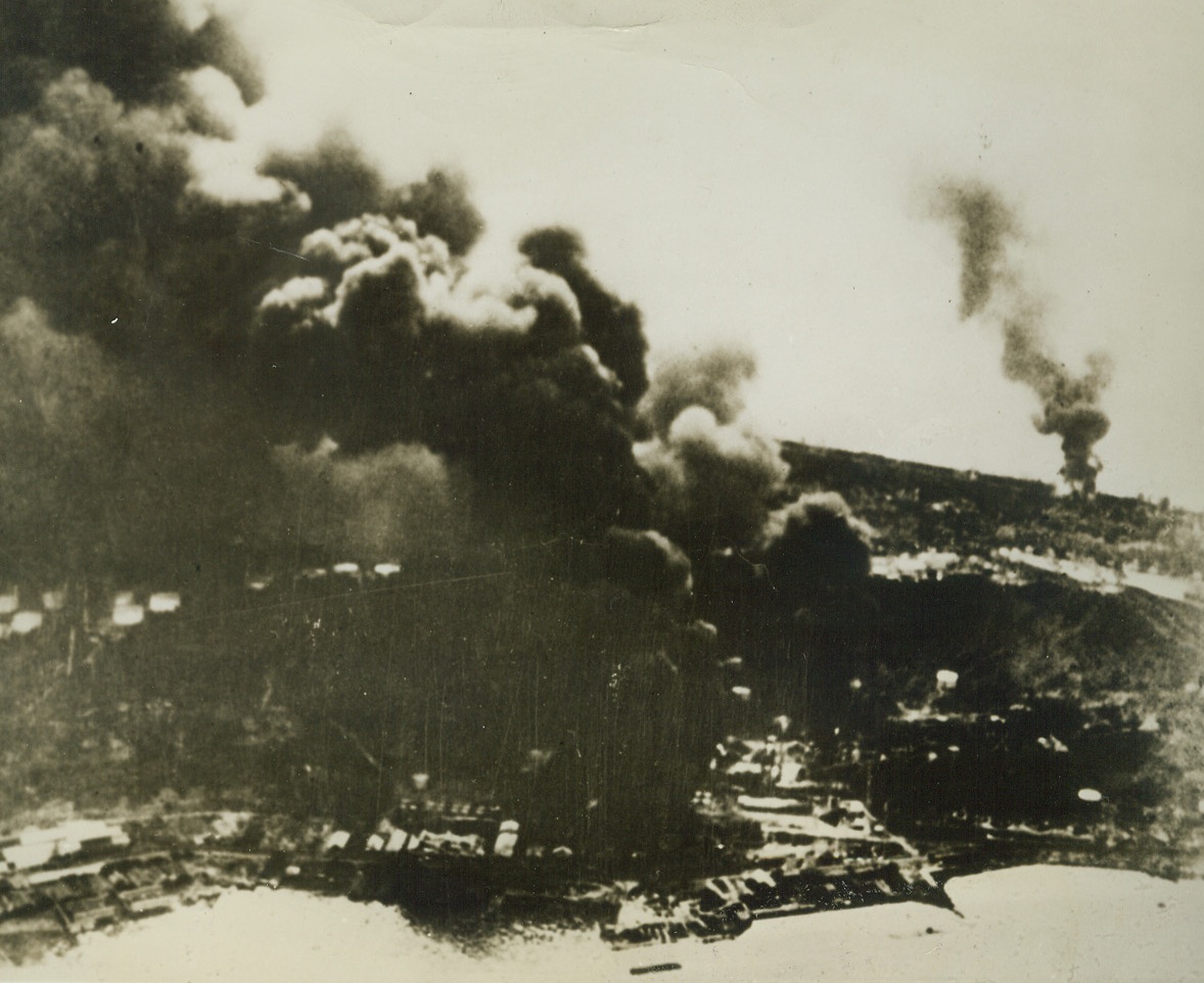 No Title. 4/6/1942. This is the first photo to reach the United States of the destruction of the valuable Balikpapan oil fields by the Dutch, to keep Japanese invaders from capturing the oil for their own use.  Heavy clouds of black smoke mark the end of the second largest oil center in the East.  Inhabitants set the fire Feb, 25th, in spite of Japanese threats to show no mercy to the inhabitants of this East coast burned center, if the oil was destroyed. Credit line (ACME);