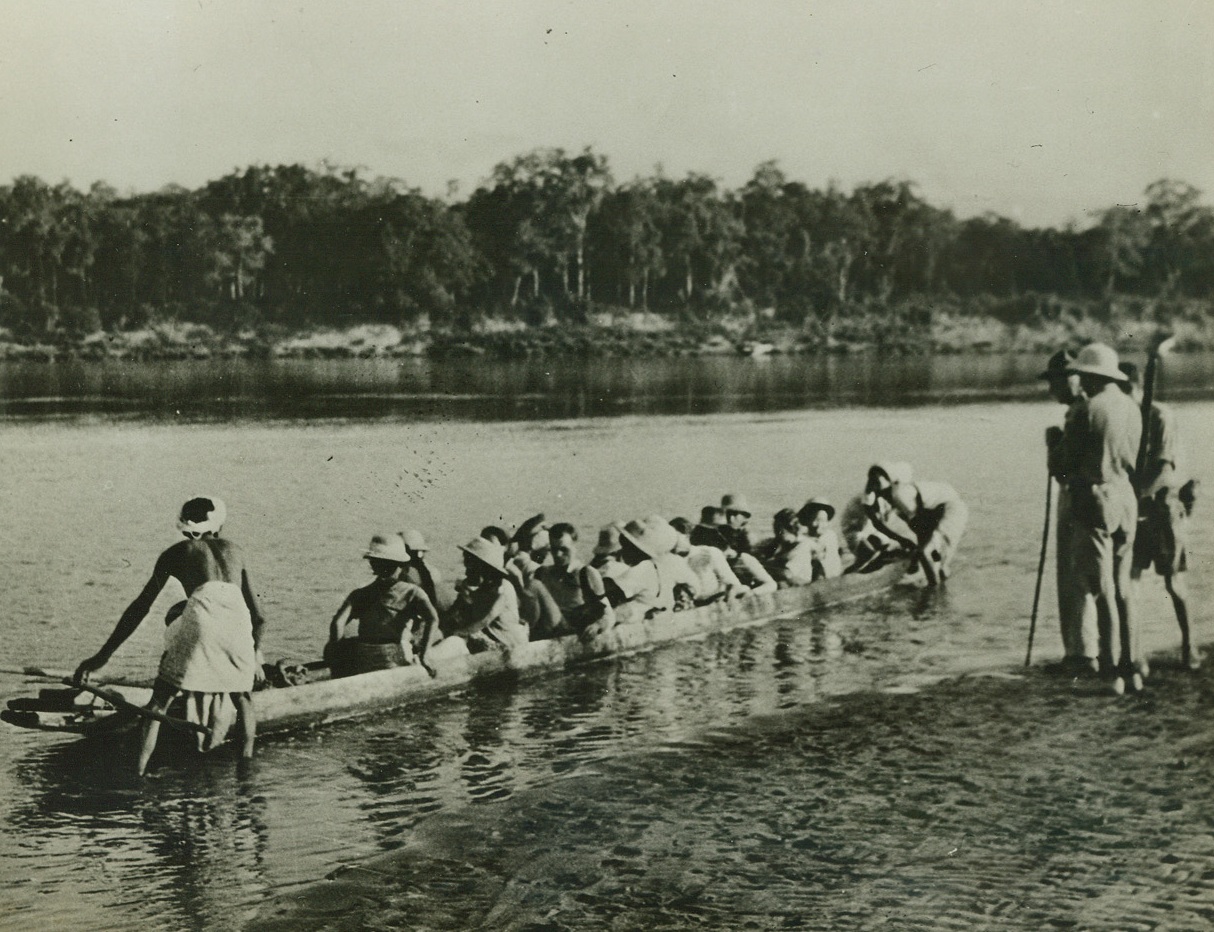 Retreat from Burma, 7/30/1942. On one of the most dramatic journeys recorded in the annals of the war, so far, Lt. Gen. Joseph W. Stillwell, at the head of a band of 114 Americans, Burmese nurses, Chinese, Indians, Britons and Anglo-Indians, covered 140 grueling miles on their retreat from Wuntho, Burma, which began on May 4th, 1942. For days the band struggled through the torturous heat of the dense malaria-infested swamps and jungles of Burma, to reach the banks of Uyu River, where they were forced to abandon the few jeeps and trucks they had, to proceed on home-made rafts, down the river to the Chindwin and thence to Imphal on the Indian frontier. They arrived at their destination, Dinjan, India, with only a few cases of malaria and heat exhaustion. Considering what they had been through, their journey was remarkably successful. Here, in a series of 25 official U.S. Army photos, just arrived from India, the story of the retreat is dramatically presented.  New York Bureau Soldiers and Burmese nurses cross the Chindwin River in dug-outs. Credit: U.S. Army Photo from ACM;