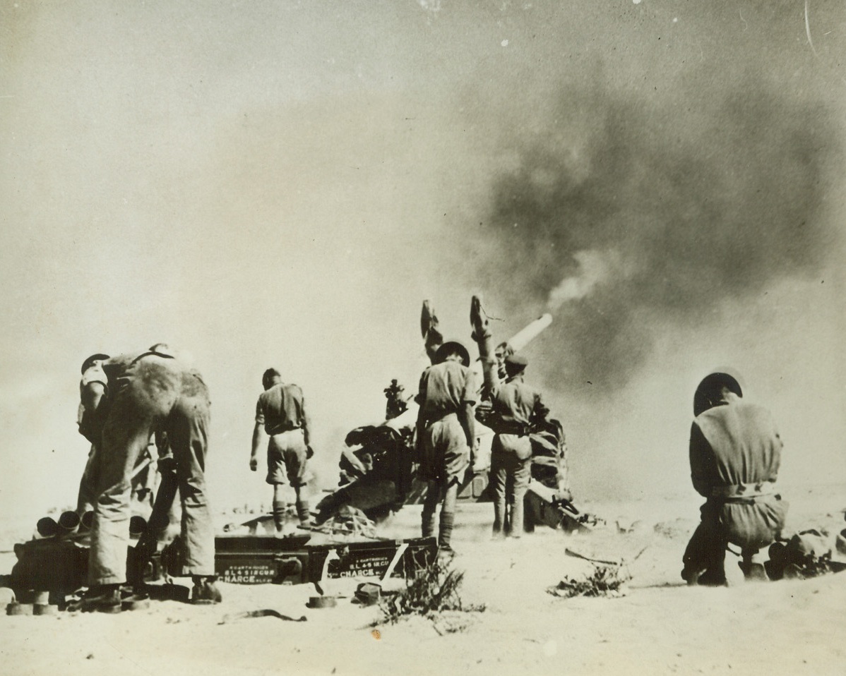 New Zealanders in Battle of Egypt, 8/3/1942. These photos of New Zealanders in the battle of Egypt were taken by official photographers during action on the El Alamein front.  Fierce New Zealand troops have joined other United Nations forces on the fighting front, and have done much to stem the axis march toward Alexandria, large British naval base in Egypt.  These are said to be the first pictures of New Zealanders’ participation in the Western Desert campaign during June and July, 1942. New York Bureau Gun of this New Zealand heavy artillery unit roars into action in the battle for Egypt. Sand storms and heat make conditions trying, but tough New Zealanders can take it. Credit line (ACME);