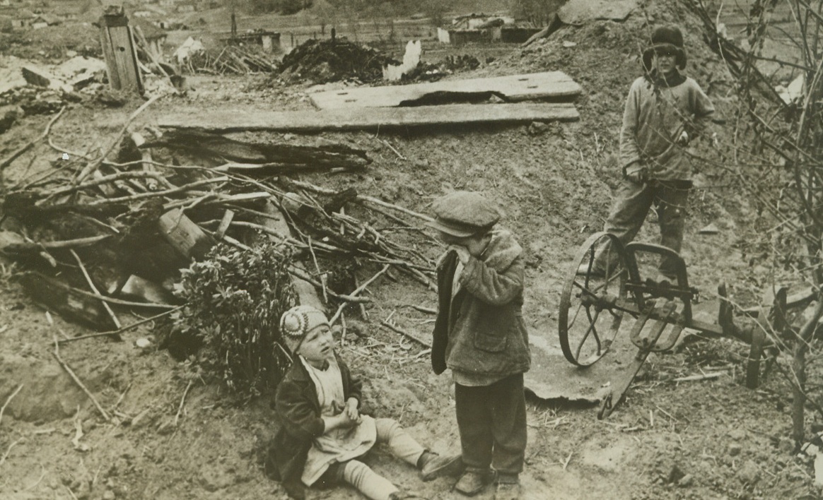 Orphans of War, 9/29/1942. GERMAN-SOVIET FRONT—These youngsters were left motherless, fatherless and homeless when the Germans demolished their home and carried off their parents in their mechanized rush through a region somewhere in the southern part of the Soviet-German border. Passed by Soviet censor. Credit: ACME;