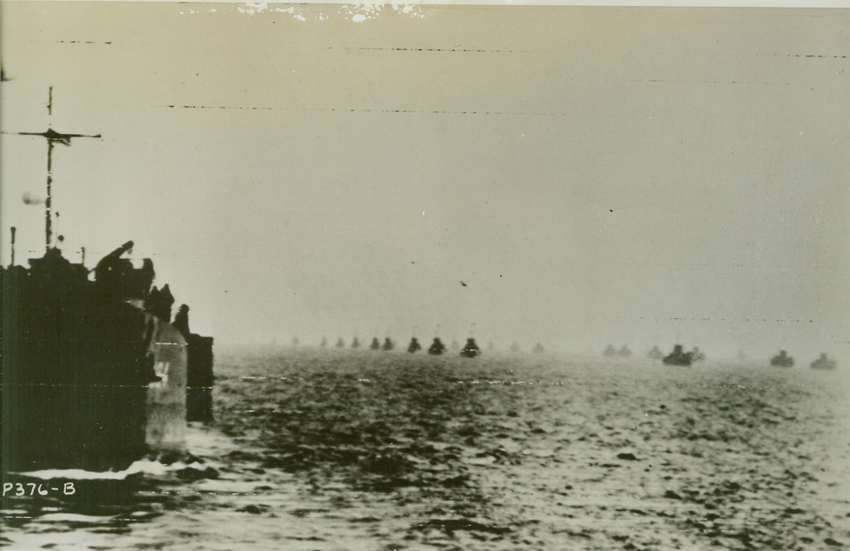 On Way to New Italian Landing, 1/26/1944. Washington, D.C.: Allied ships, transporting soldiers and their equipment, plough through the sea en route to the new landings on the west coast of Italy, south of Rome. Credit (ACME photo by Bert Brandt for War Picture Pool via Army Radiotelephoto);