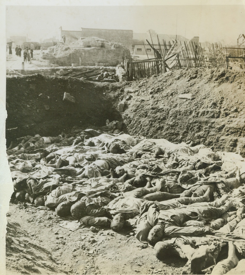 These are the Dead, 1/29/1944. Changteh, China – Chinese soldiers, in open combat, are giving their answer to Japan’s barbarity. This is a common grave for Jap soldiers, dug by the Chinese, on the battlefield at Changteh, where the sons of China routed their enemies on December 3rd. Taken by the Chinese Ministry of Information, this is one of the first photos of Changteh battle scenes to be released. Credit: (ACME);