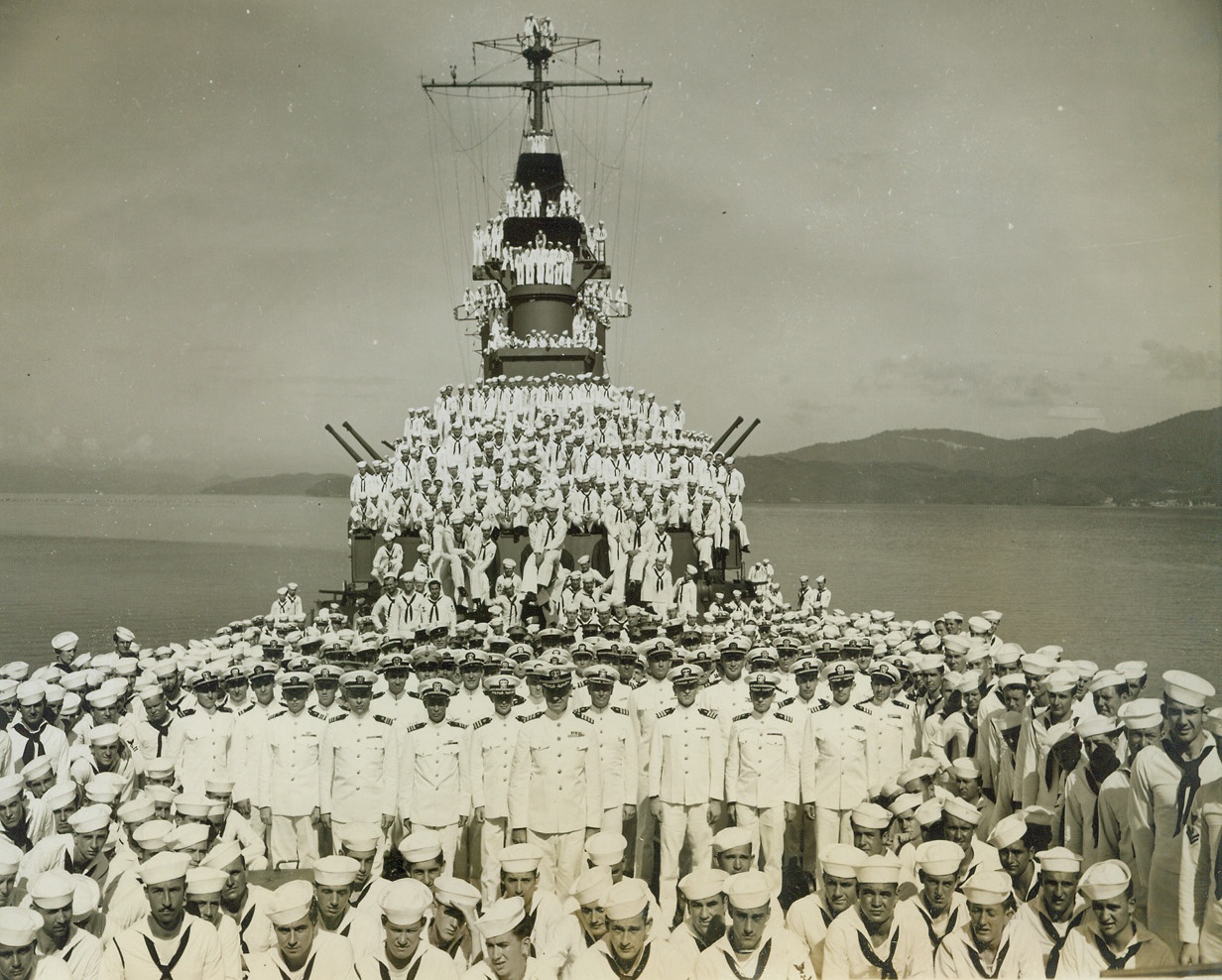 Shakedown Cruise, 1/26/1944. . AT SEA – A vital part of the training of men who fight at sea is the shakedown cruise, the run on which embryo sailors try their sea legs, get acquainted with their shipmates, and learn how to operate their ship. Here are some of the white garbed Navy men going out for their shakedown cruise. Although every inch of standing room in this section of the ship is utilized, only a portion of the vessel’s crew is shown.Credit: U.S. Navy photo from ACME;