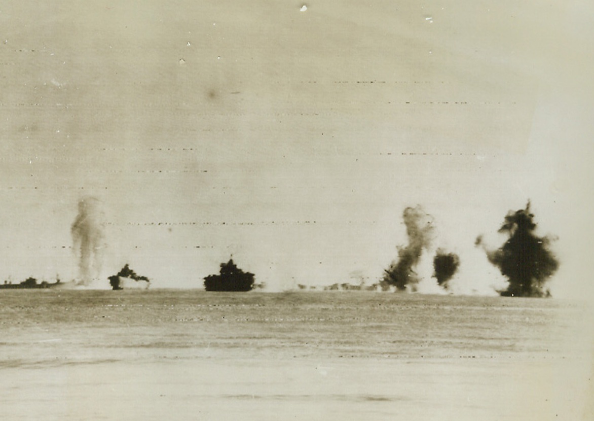 Close Shave, 1/31/1944. Washington, D.C.: German bombs miss their targets of Allied ships near Anzio Harbor, Italy.  Credit: ACME photo by Bert Brandt for “AR Picture Pool via Army radiotelephoto.;