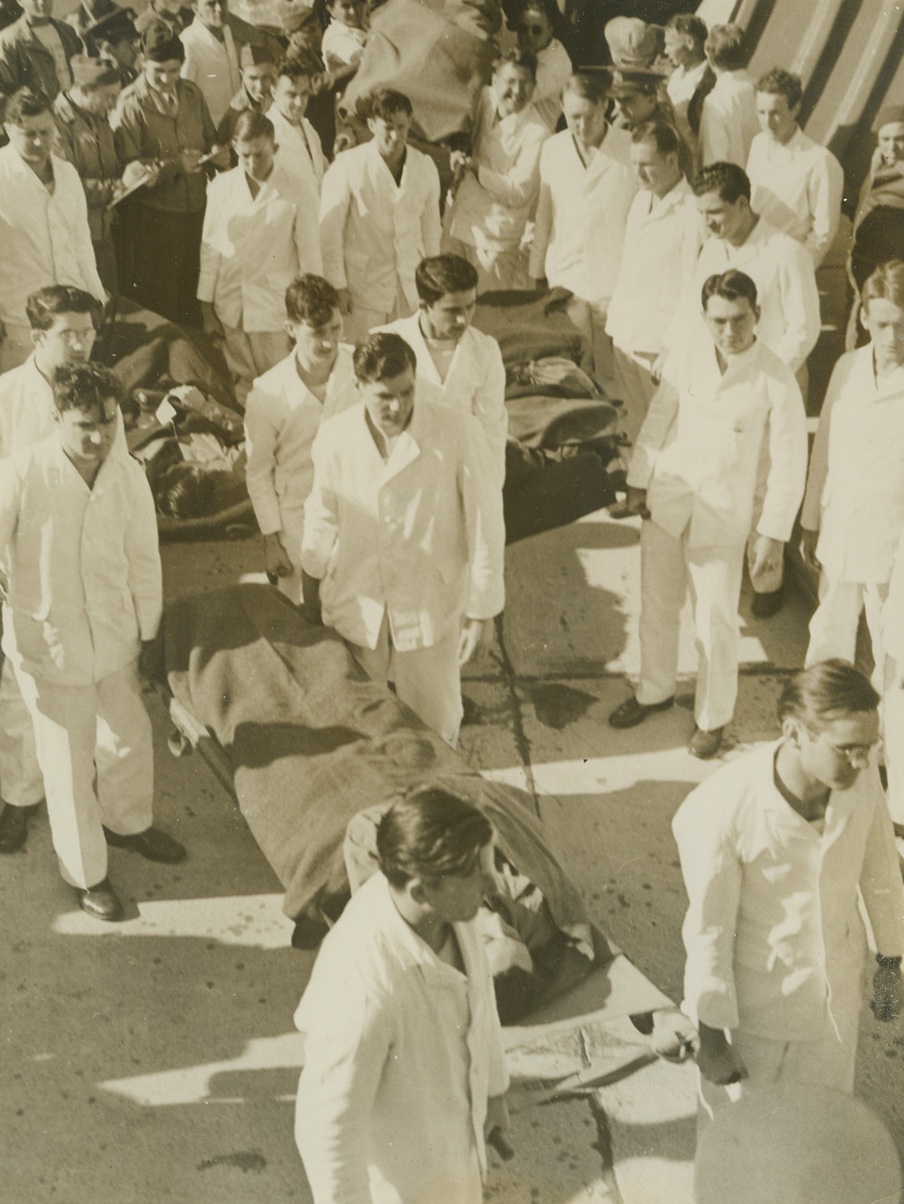 Patients Moved in First Massed Flight, 1/13/1944. Temple, Texas—Plenty of enlisted men were on hand as stretcher bearers and 16 ambulances were used to transfer patients from airplanes to McCloskey General Hospital in Temple, after the arrival of the first convoy of patients to be sent by air in continental United States. The patients, from Stark General Hospital, Charleston, S.C., were flown to Temple in planes of the Air Transport Command.Credit: U.S. Signal Corps photo from ACME.;