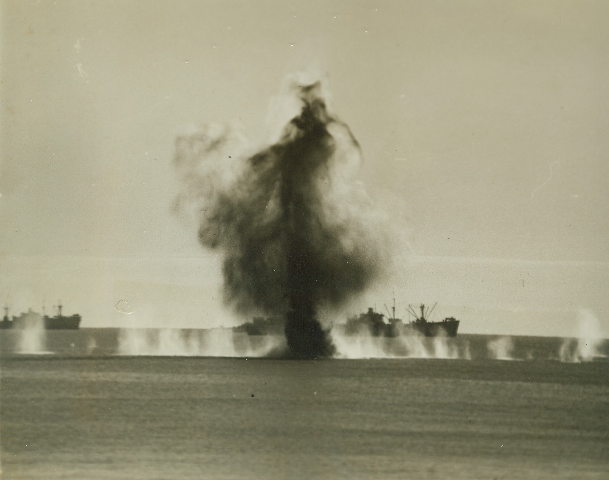 Nazi Shells Hit Only Water, 2/26/1944. NETTUNO, ITALY – A smoky spray of sea water rises high as German shells miss their mark. Attempting to batter Allied shipping off Nettuno from their positions along the coastline north of Anzio, the Germans kick up only wicked streams of water and American ships are seldom hit. Credit Line – WP - (Acme photo by Bert Brandt for the War Picture Pool);