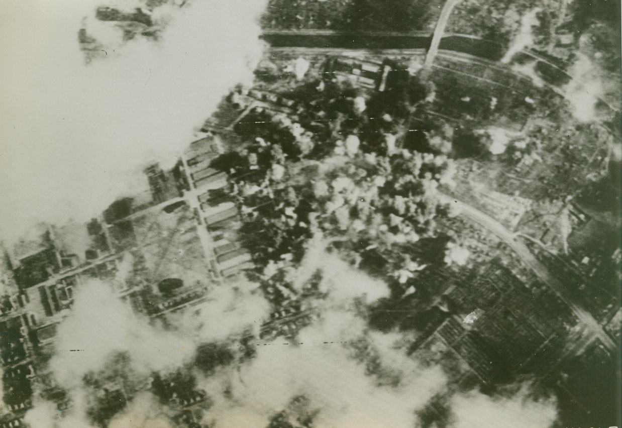 UNITED STATES BOMBS BURST ON BERLIN, 3/8/1944. American calling cards bursting on targets in the March 6th raid on Berlin in the second time in three days. Liberators and Fortresses took part in the raid. Credit: U S Army Air Force photo via radiotelephoto from Acme;