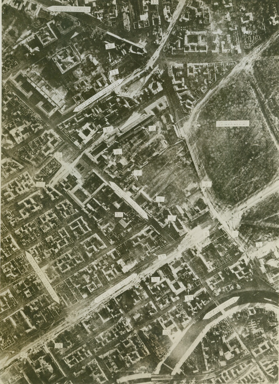 Berlin -- Before and After, 3/30/1944. - Ministry of Armaments and Munitions, gutted; 3 - French Embassy, gutted; 4 - British Embassy, gutted; 5 - Ministry of Food and Agriculture, severely damaged; 6 - Goebbel's private residence (top floors burned out but roof repaired); 7 - Old President's Chancellery (probably Ribbentrop's residence) and Foreign Office; 8 - Hitler's Chancellery and residence (badly damaged, but roof repaired); 9 - New Reich Chancellery (undamaged); 10 - Ministry of Transportation and State Railway Directorate, gutted; 11 - Offices of Goebing (damaged, but repairs in progress); 12 - Forestry Office (wrecked); 13 - Potsdamer station, wrecked; 16 - Ministry of Fisheries, mostly gutted; 17 - Ministry of Education, damaged; 18 - Home office, burned out; 19 - Army Records Office, (damaged by fire); 20 - Post Office, (damaged by fire); 21 - State Library (damaged); Here is a photo of the heart of Berlin, vital nerve center of the Third Reich, made on March 8th. Compare with Acme photo, made in September, 1943, before the Allies began to bomb Berlin in earnest.  Key: 1 - Reichstag, burned out in 1933, now further damaged; reasury, damaged 15 - Kaiserhof Hotel (Top floors burned out); 22 - University (damaged) Cr;