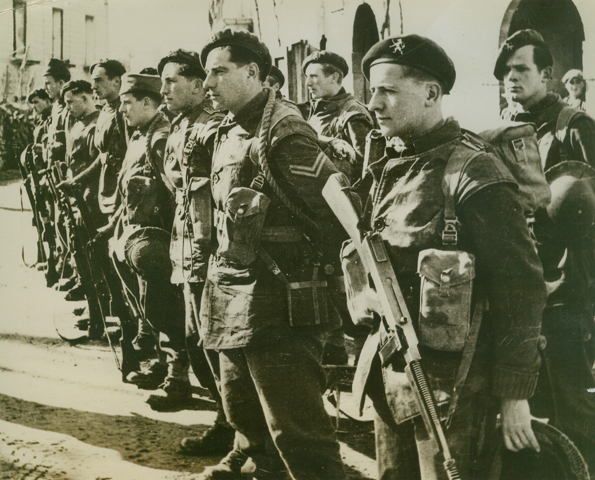 Fighting With Allies in Italy, 3/13/1944. ITALY – After spending two weeks wiping out Nazi machine gun nests in the mountainous region north of the Garigliano River, Belgian commandos return to their temporary base at the foot of Mount Camino, Italy. The hard-fighting Belgians are battling the Germans alongside of the Americans and British. Credit Line (Acme);