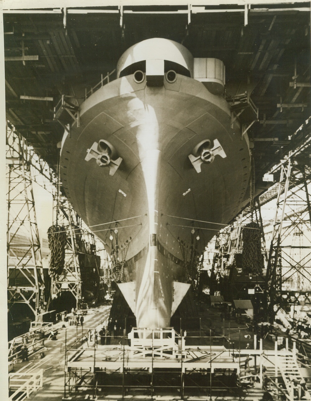 New Carrier, 4/22/1944. New York, N.Y. – The U.S.S. Bon Homme Richard, 27,100-ton Essex Class aircraft carrier, will be launched Sat., April 29, at the New York Navy Yard. Mrs. John S. McCain, wife of Vice Adm. McCain, USN, will be the sponsor. The new carrier, named for the Continental frigate made famous by Capt. John Paul Jones, is the second carrier built at the yard in Brooklyn. Credit: US Navy Photo from ACME;