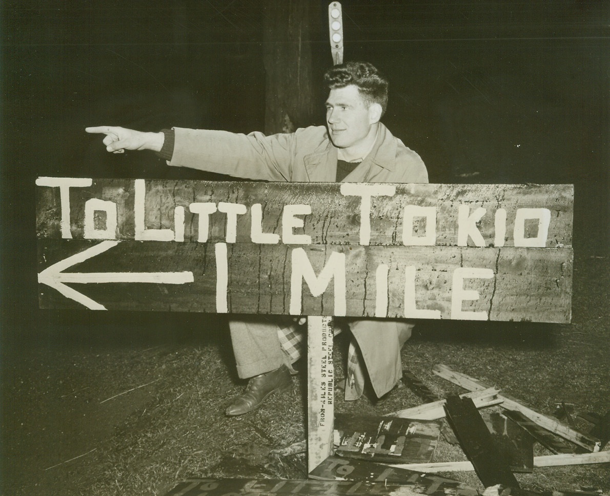 Unwelcome Neighbors, 4/13/1944. GREAT MEADOWS, NJ—Five Japanese Evacuees who thought they might have a chance to start anew on the muckland Farms of New Jersey’s Warren County, packed up their bags and prepared to leave Great meadows as outraged farmers threatened to run them out with shotguns, if necessary.  Placed on the farm of Edward Kowalick on a tenant basis by the War Relocation Authority, the Japanese didn’t have a chance to prove their loyalty before irate neighbors, many of whom have relatives in the service, demanded that they be ousted.  Kowalick yielded to the pressure of his neighbors after his shed, holding seven tons of fertilizer, burned down causing $800 damage.  Here is a sign on route 6 erected by protesting farmers, pointing in the direction of the Kowalick Farm.  John Nykun, a recently discharged Great Meadows soldier, points in the same direction as the sign. Credit:  ACME;