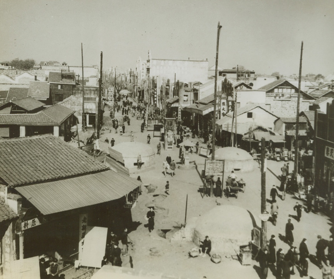 Changsha – Jap Nemesis, 6/3/1944. China – Pillboxes line the Nan Tsen Road in Changsha – the Chinese city in the Hunan Province which, for the fourth time, is now threatened by Japanese forces. Each time the Japanese Army set out to conquer Changsha, they were driven back by Chinese troops in ignominous defeat. The new Jap drive may bring the invaders disastrous defeat again in their attempt to capture the strategic and well-defended city. Changsha has been virtually rebuilt after the poundings it suffered during the previous Japanese drives. Ruins, however, still stand side by side with new buildings. Credit: Chinese Ministry of Information photo from ACME;