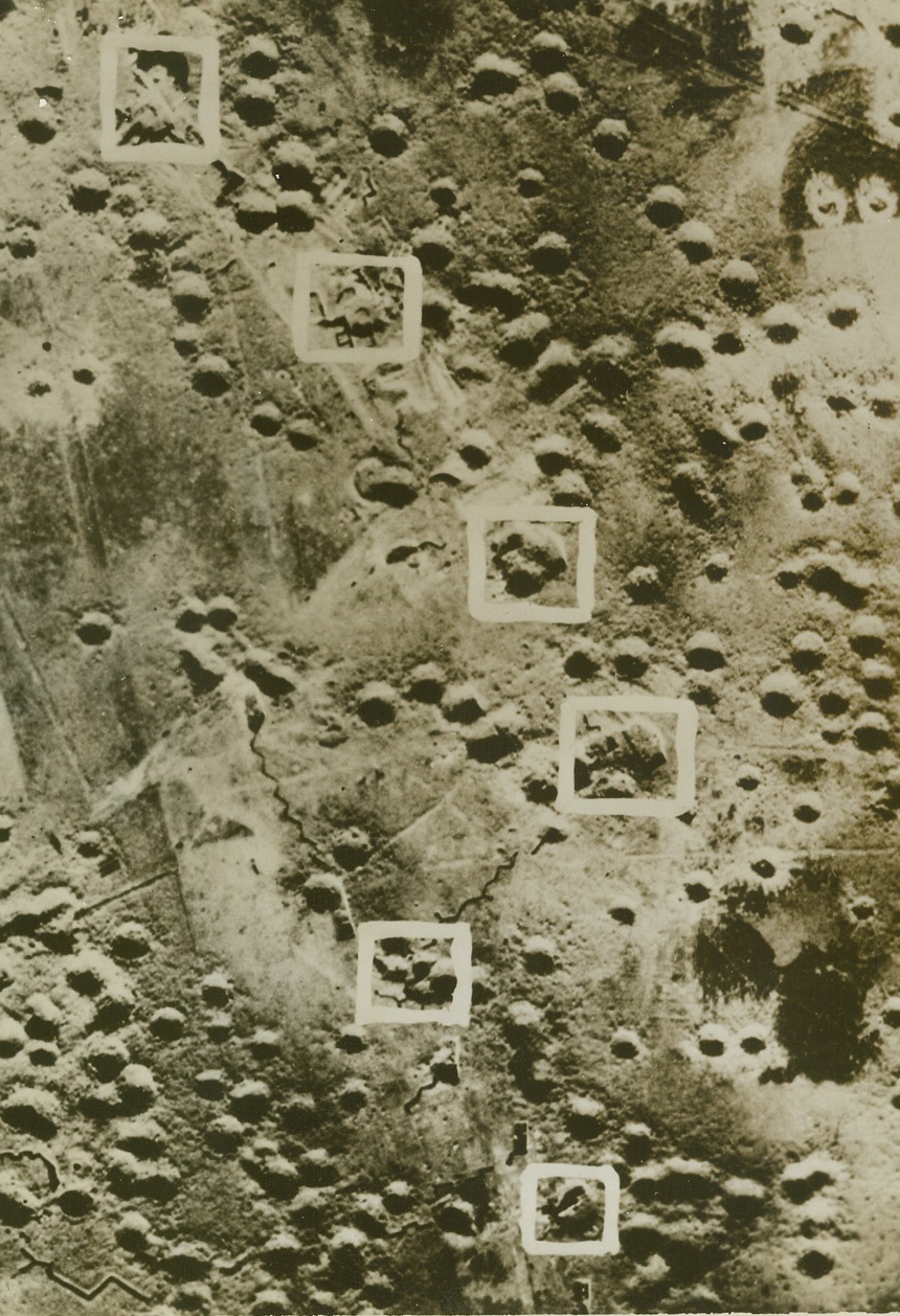 SIX THAT WENT BOOM, 6/12/1944. ST. VALERY EN CAUX, FRANCE—Surrounded by the pock marks left by Allied bombs, these six Nazi defense guns (each one outlined in white) at St. Valery en Caux were blasted to smithereens by RAF bombers in a pre-invasion Channel coast raid on May 27th. The attaching planes scored six direct hits and wiped out the entire battery before they left.  Credit Line (ACME);