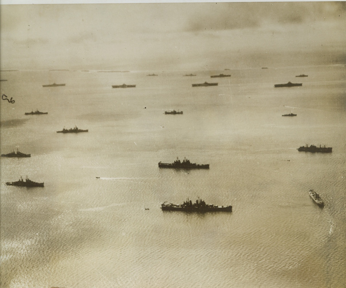 Recipe for Jap Nightmare, 7/8/1944. PACIFIC - Stretching as far as the eye can see all the ingredients that go into the making of a Japanese nightmare lie in wait for the next assignment after arriving in this Pacific harbor back from chasing the Jap fleet in the Philippine Sea. Six carriers are among this part of a might U.S. Navy Task Force anxious for another crack at the Japs. Forces like this one have struck repeatedly at enemy bases, coming within 500 miles on the Nipponese capital.  Credit (US Navy Photo from ACME);