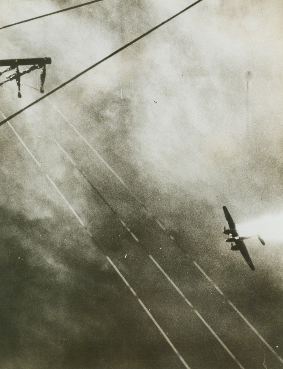 Jap Plane Goes Down, 7/24/1944. Testifying to the accuracy of U.S. Navy anti aircraft fire, this photo shows the fiery end of a Jap twin-engined plane shot down in the Pacific by an American flattop’s gunners.  Streaming smoke and flame, the plane plummets into the ocean. Credit line (U.S. Navy photo from ACME);