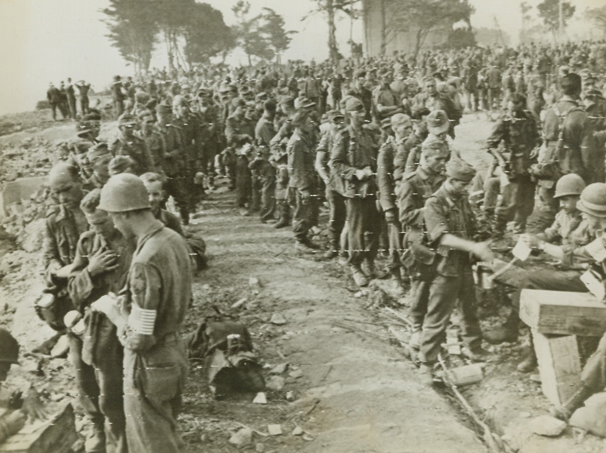 France – Military traffic streams through devastated St. Lo, just a little while back the scene of terrific battles, but now far behind the fighting front. Yank advance through Brittany is at a speed almost greater than that achieved by any army in World War II. Credit: Army photo from ACME; , 8/22/1944. St. Tropez, France – Yanks in the rear lines are kept busy tabulating the war prisoners that come in by the thousands. Here American Military Police keep track of the droves of Nazi prisoners near St. Tropez, France, following their capture by Allies pushing northward from the southern France beachhead. Credit: US Army Radiotelephoto from ACME;