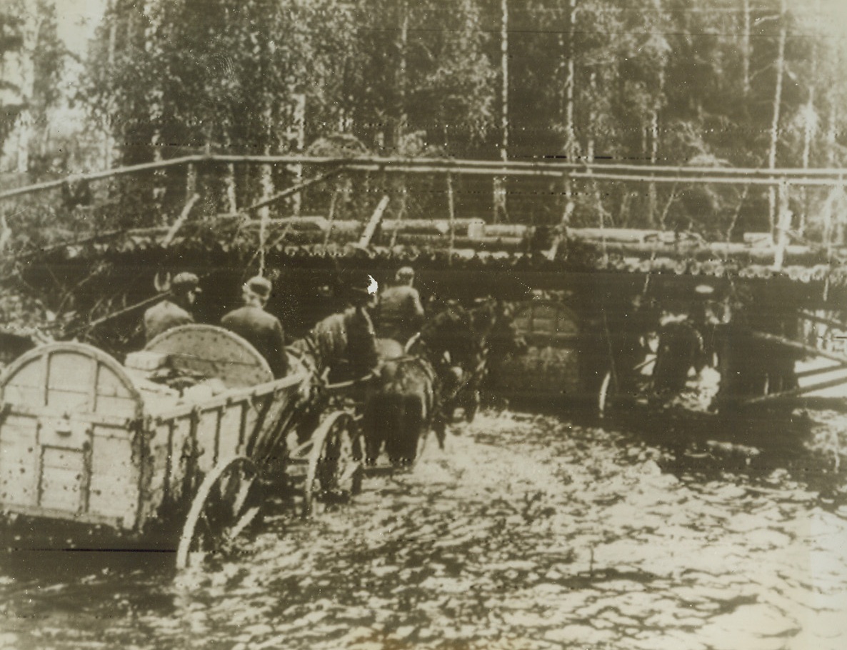 SPEEDY RETREAT, 9/5/1944. Using horses, a German supply column retreats on the east front, using the “river as a road.” According to the German caption accompanying the photo, this means is “faster and easier than other ways of transportation.” Credit: Acme radiophoto;