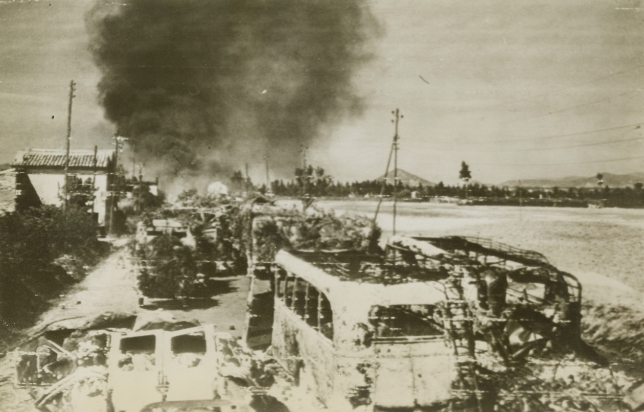 Nazi Convoy Joins The Fishes, 9/2/1944. France - A few of the 400 camouflaged Nazi vehicles are shown, wrecked and burning, after the enemy convoy was trapped and destroyed near Montelimar, France, by small arms and mortar fire, from the U.S. 7th Army. Credit: Army Radiotelephoto from ACME;