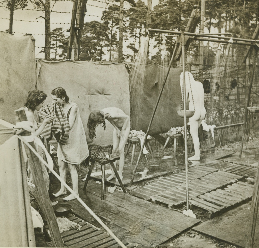 It’s Good to Be Clean, 5/3/1945. Germany – Former occupants at the German horror camp in Belsen, these women take their first bath for three years in a hot shower set up by the British who liberated the camp. Note emaciated condition of these ex-preisoners who were victims of the Nazi starvation diet. Credit (British Official Photo From ACME);