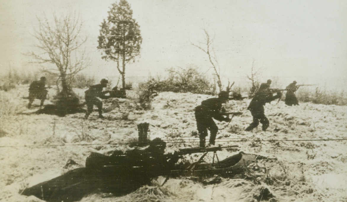 Reds Understand Soviet Winter. SOMEWHERE IN RUSSIA—A light sled forms a practical mount for a sub-machine gun on the northwestern Soviet front. It glides easily over the snow and the sub-machine gun operator covers the advance of Red infantry. Blizzards are sweeping the Stalingrad front, bogging down Nazi units and trapping mines and tanks deep in the shifting snow banks.Credit: ACME;