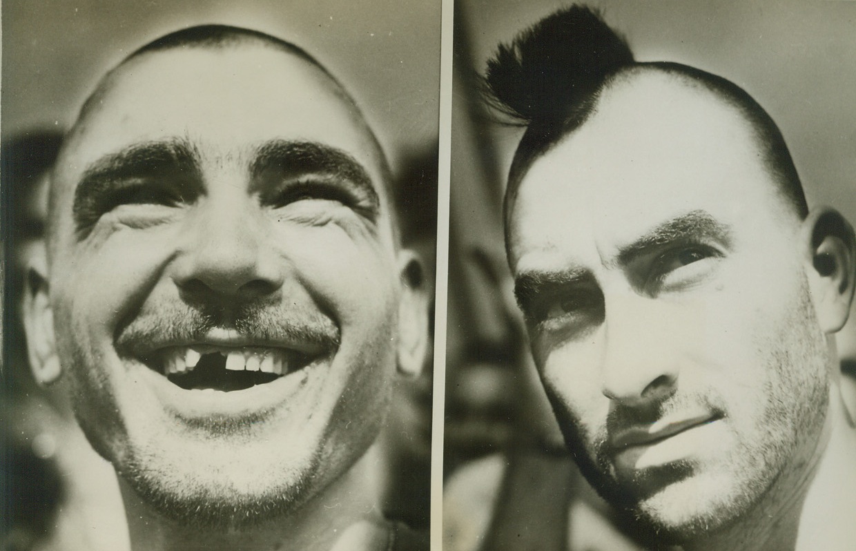 Comfory Coiffures for Combat. South Pacific – It looks like these coast guardsmen are going to put on their own Easter show out in the South Pacific.  They have adopted these novel (if somewhat abbreviated!) hair styles for comfort during combat in the steaming tropics.  The gent at the left with the “openwork” teeth says it with a smile, while his buddy (right), does a “maiden swoon” profile for the ladies, with a “scalp-lock hairdo”.;