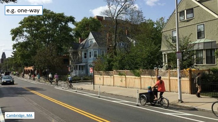 Example of one-way bike lane protected by delineators.