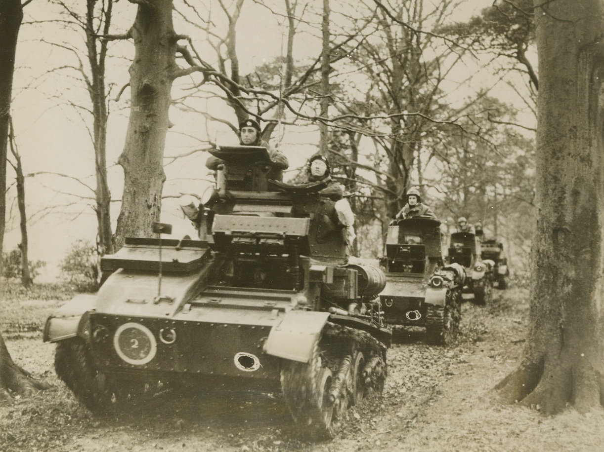 Norse Ready to Help England Thwart Invasion, 12/26/1940  England—As England prepared to meet new threats of invasion, these Norweigan tankmen participated in large-scale maneuvers “somewhere in Britain,” together with British forces. Among the interested spectators was Crown Prince Olaf, of Norway, who recently flew to the United States to spend Christmas with his Princess and family  Credit: ACME;