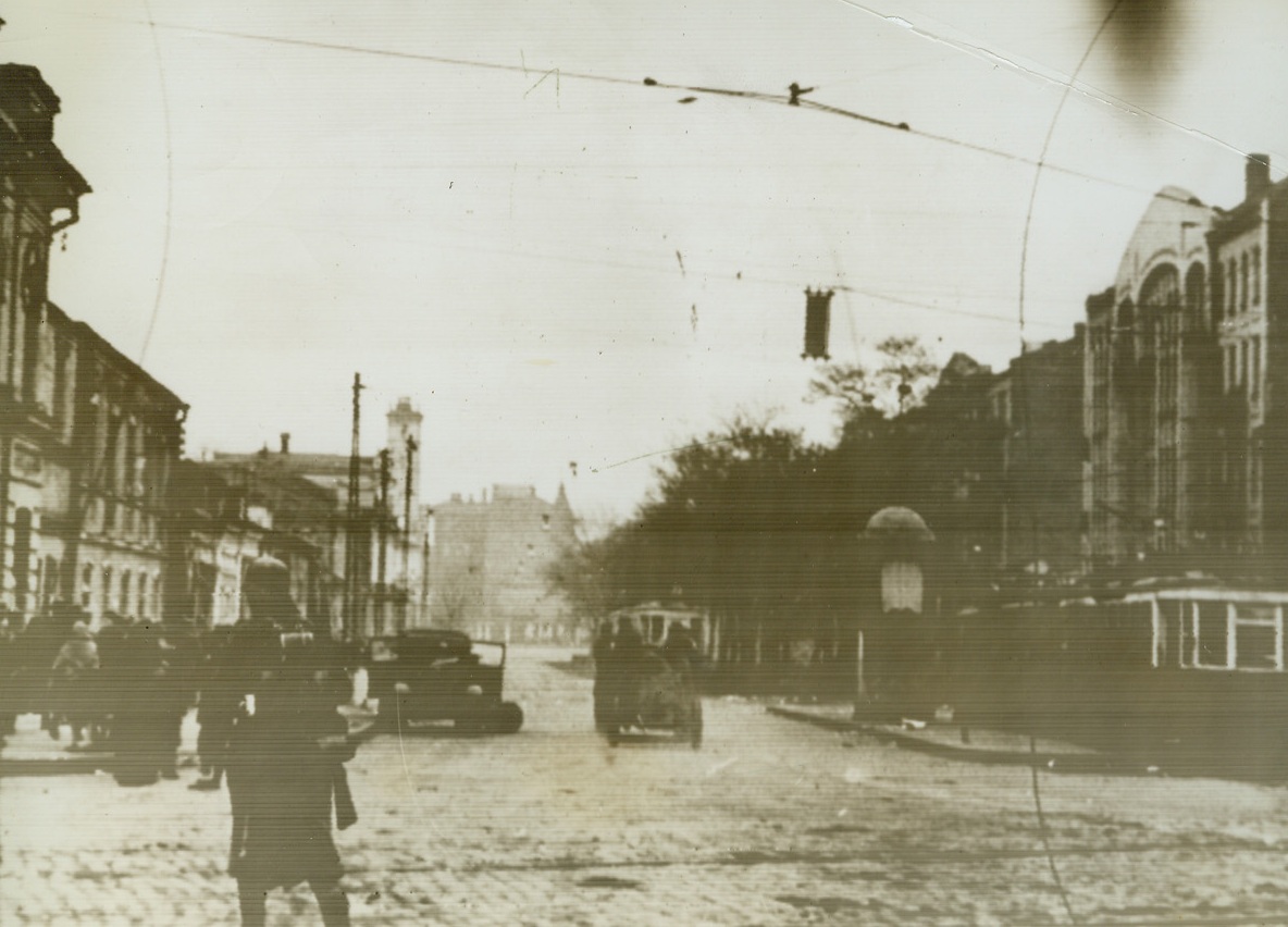 Germans Enter Kharov, 10/28/41  Another Russian city into which Germany’s military machine has marched is Kharov, on the way to the highly desirable Donets Basin. No cheering crowd greeted the conquerors. No visible damage to the city is apparent from this radiophoto, flashed from Berlin to New York today (October 28).Credit: Official German photo from ACME;