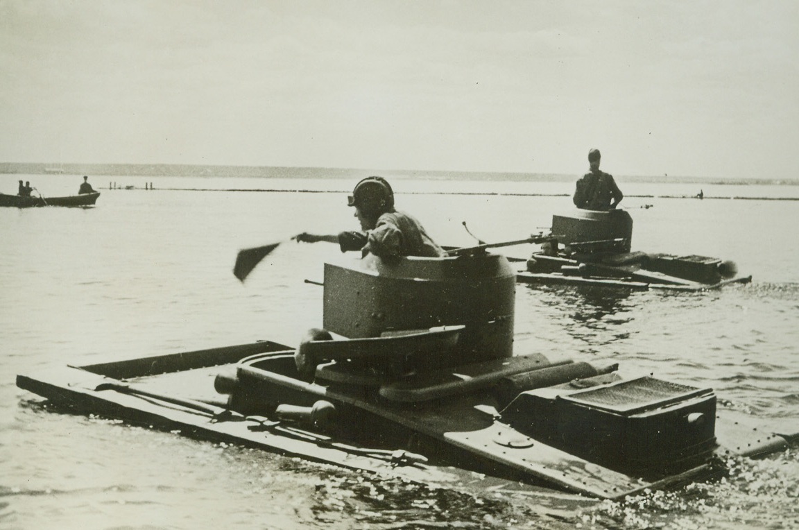 Red Army Land-Water Tanks, 10/29/41  RUSSIA—Soviet amphibian tanks make their way across a Russian river. Such scenes as this are now being enacted as the Russians defend their terrain against the German mighty advance and possible pincer movement. Credit: ACME;