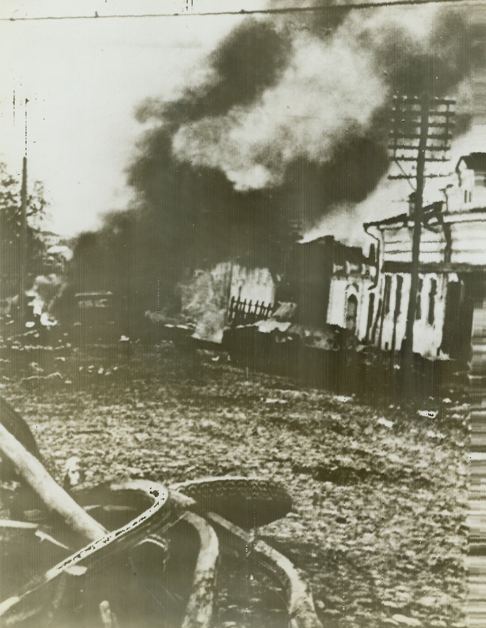 Scene After Reds Lost Last-Stand Battle, 11/3/41  RUSSIA—This is a street scene. Shown is an unidentified Soviet village after Red Army troops lost a last-stand battle, according to the German censor approved caption accompanying this radiophoto, flashed from Berlin to New York today. Credit: Official German photo from ACME;